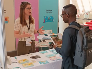 Elizabeth Tully talking to an AHAIC attendee